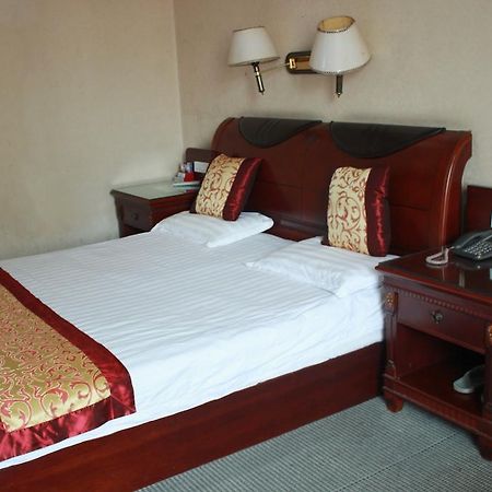 Taizhou Taishan Business Hotel Kamer foto