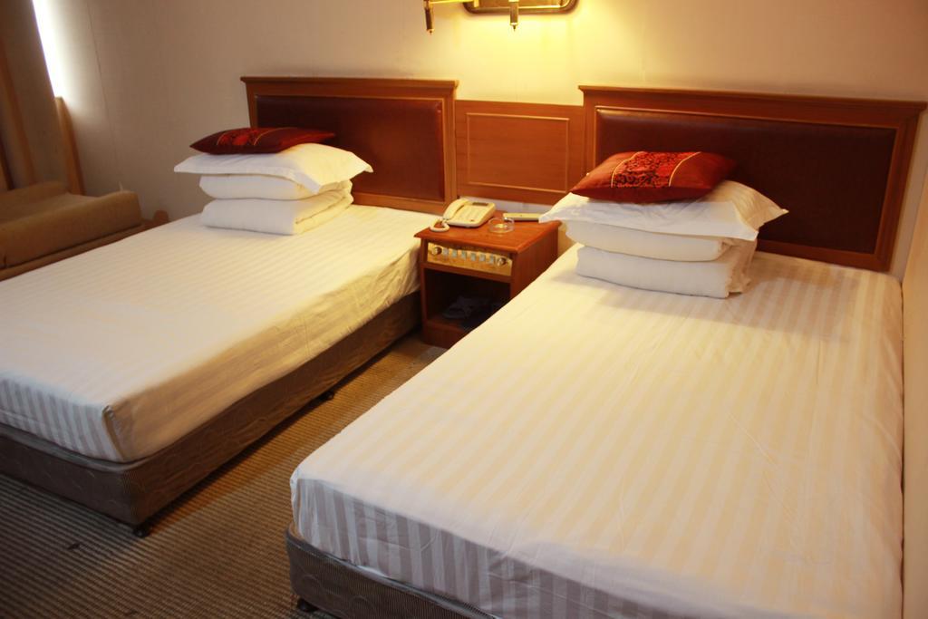 Taizhou Taishan Business Hotel Kamer foto